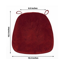 A burgundy velvet chair cushion pad with measurements of 9.5 inches and 15.5 inches