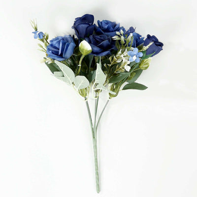 Blue artificial rose bouquet with greenery