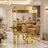 Golden dessert cart with elegant pastries in a luxurious setting.