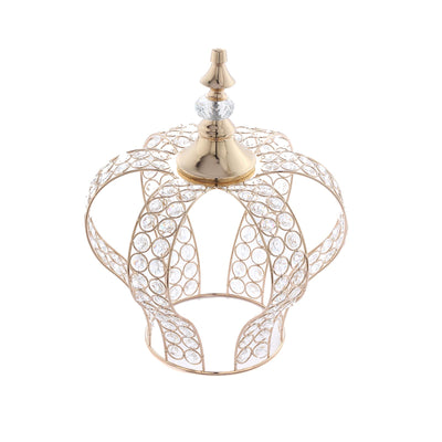 Gold and crystal crown decorative piece on a white background