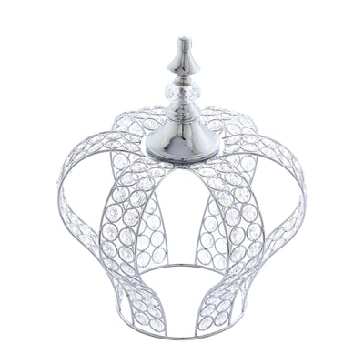 Silver crown with crystal embellishments on a white background