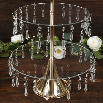 Elegant two-tier cake stand with crystal beads and gold base.