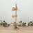 Elegant three-tiered dessert stand with crystal accents and assorted treats.
