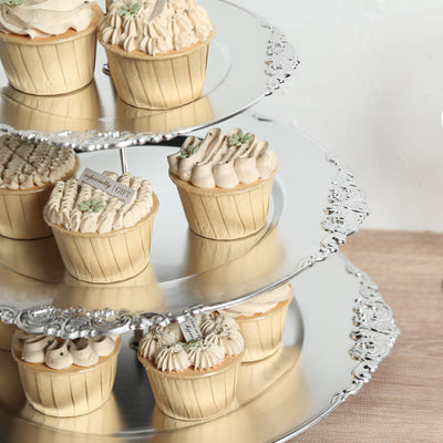 Elegant tiered cupcake stand with beautifully decorated cupcakes.