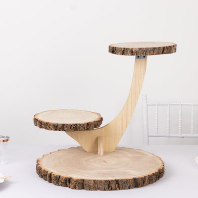 Wooden tiered cake stand with natural bark edge.