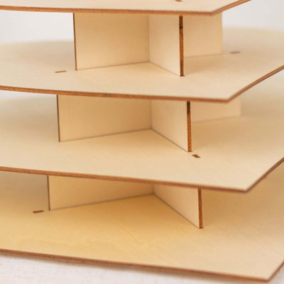 Layered wooden display stand with multiple tiers.