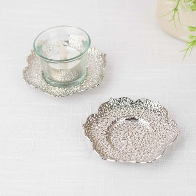 Decorative silver trays with textured design for candle holder