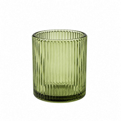 Green ribbed glass tumbler on white background#whtbkgd