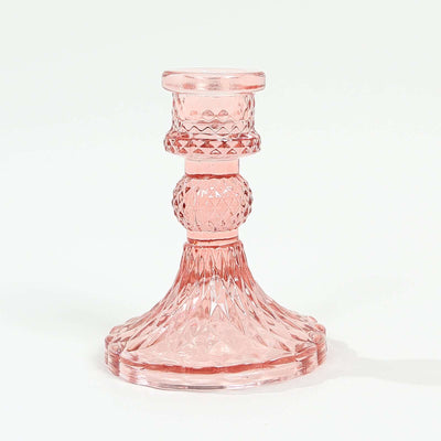 Pink crystal candle holder with intricate detailing