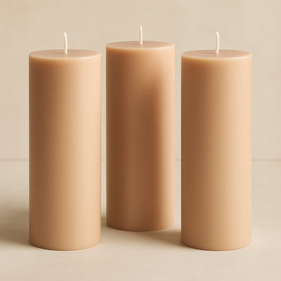 Neutral beige pillar candles in varying heights