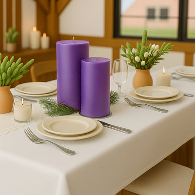 Purple candles on a dining table set with plates and decorative greenery.