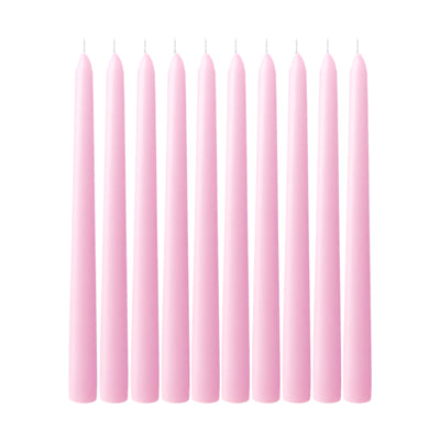 Set of 12 pink taper candles against a white background.