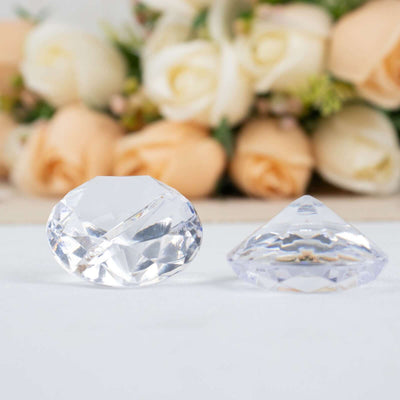 Clear crystal decorative pieces on a floral background.