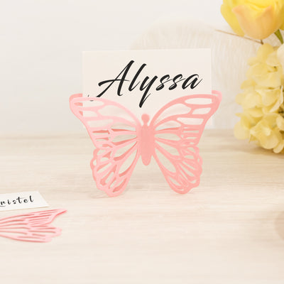 Pink butterfly place card holder for elegant table settings.