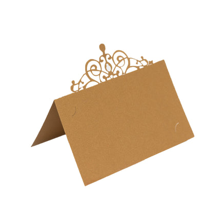 Gold place card with decorative cutout design on top