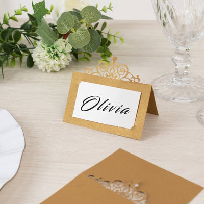 Elegant gold place card with the name "Olivia" for event decor.