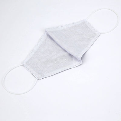 White fabric face mask on a plain white background