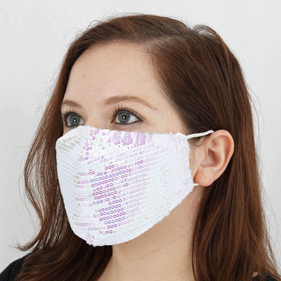 Woman wearing a sequined face mask in a close-up shot.