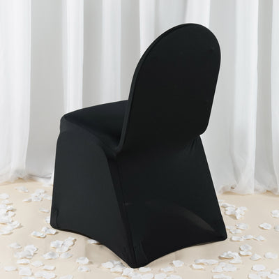 Black chair with a sleek design on a soft background.