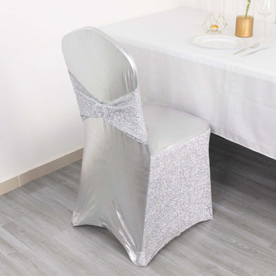 Silver glitter chair cover for elegant dining decor.