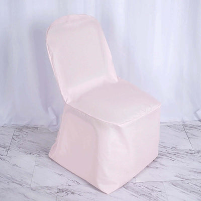 Pink chair cover on a white backdrop for event decor.
