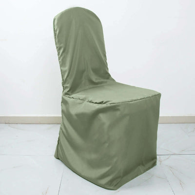 Green chair cover on a plain backdrop.