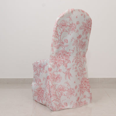 Pink floral-patterned chair cover on a plain background.