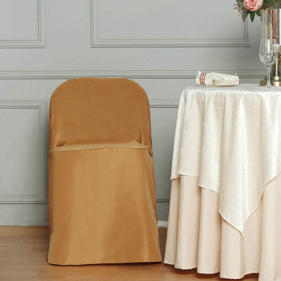 Elegant brown chair cover draped over a chair beside a table setting.