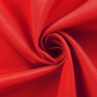 Red fabric texture in a spiral pattern.