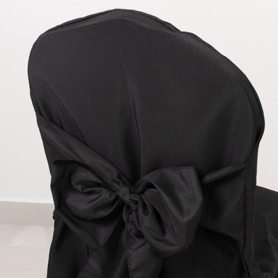 Black chair cover with bow detail on back