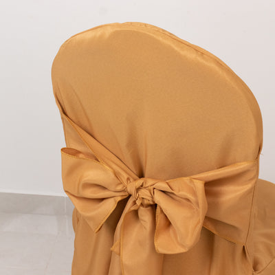 Gold satin chair cover with a large bow detail.