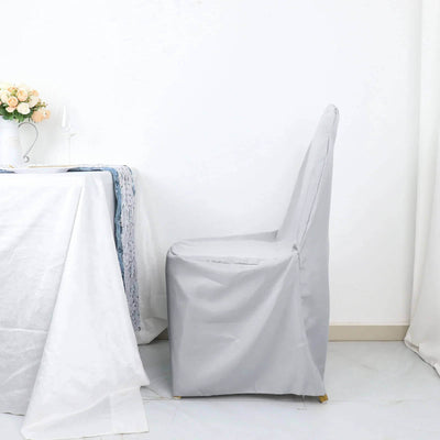 Gray chair cover on a plain white backdrop