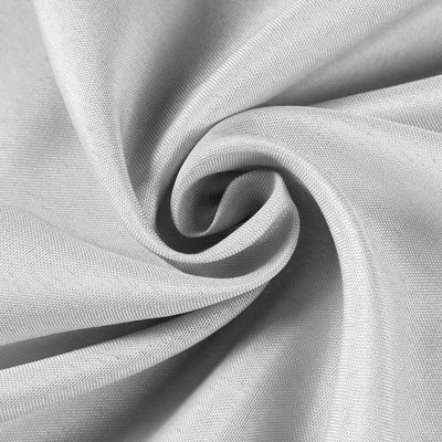 Gray fabric texture in a swirling pattern.
