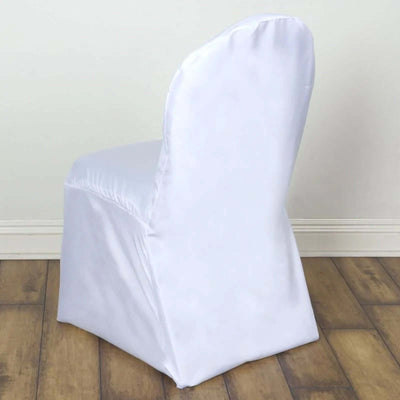 White chair cover draped over a chair in a studio setting.