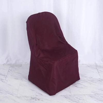 Maroon chair cover on a plain backdrop for protection and style