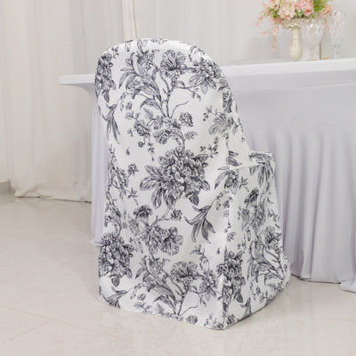 Floral patterned chair cover on a plain backdrop.