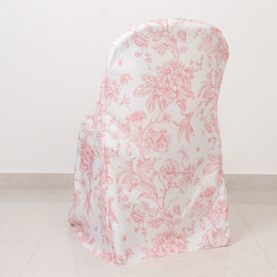 Floral-patterned chair cover in pink and white on a plain backdrop.