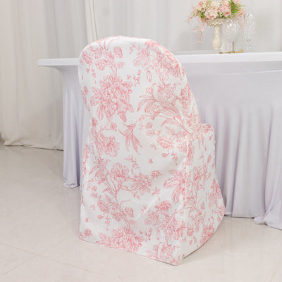 Floral-patterned chair cover on a white table in a decorated setting.