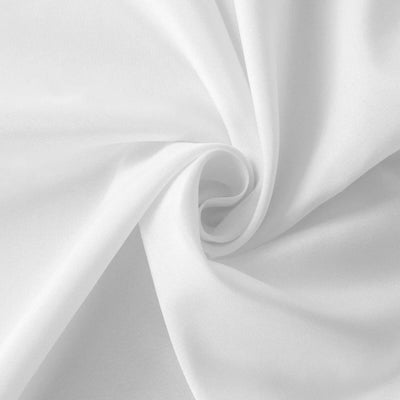 White fabric texture with soft draping.
