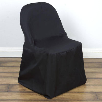 Black chair cover on a wooden floor.