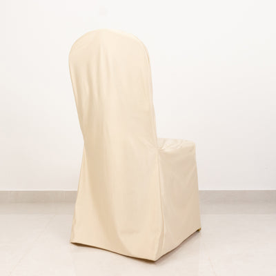 Cream chair cover on a plain backdrop