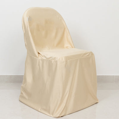 Beige chair cover on a plain background for event decor and protection.