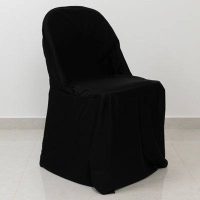 Black chair cover on a chair against a plain background.