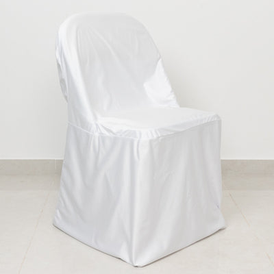 White chair cover on a plain backdrop for event decor inspiration.