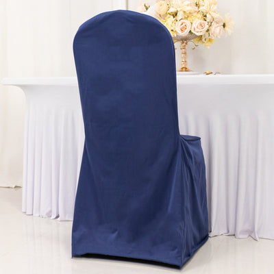 Navy blue chair cover on a white table with floral centerpiece