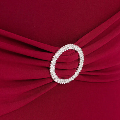 Elegant burgundy dress with sparkling circular belt detail.