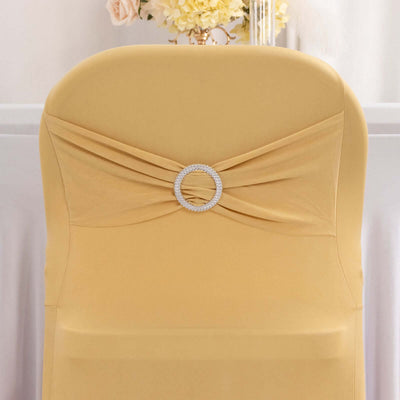 Yellow chair cover with rhinestone embellishment for elegant events.