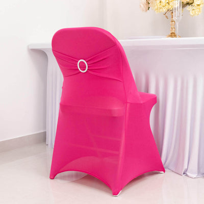 Pink chair cover with decorative bow for events and parties.