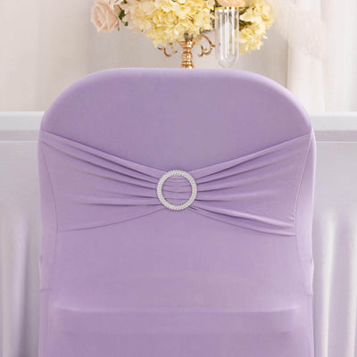 Purple chair cover with rhinestone detail for elegant events.