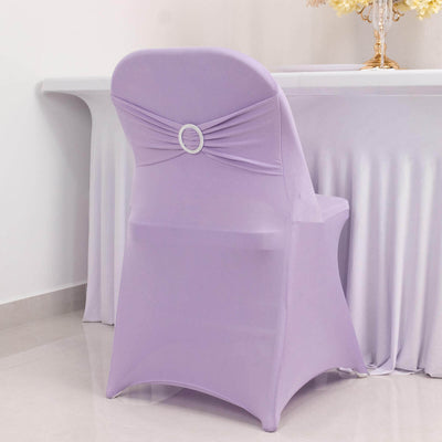 Lavender chair cover with decorative buckle detail on a table setting.